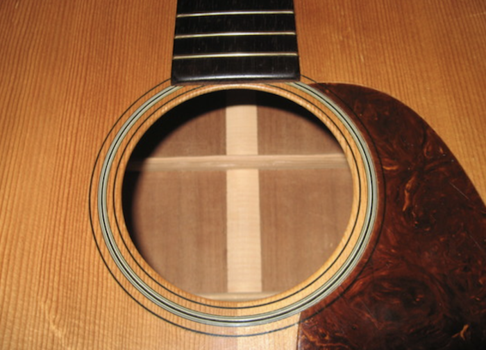 Sitka spruce guitar top showing the narrow, tight grain running vertically